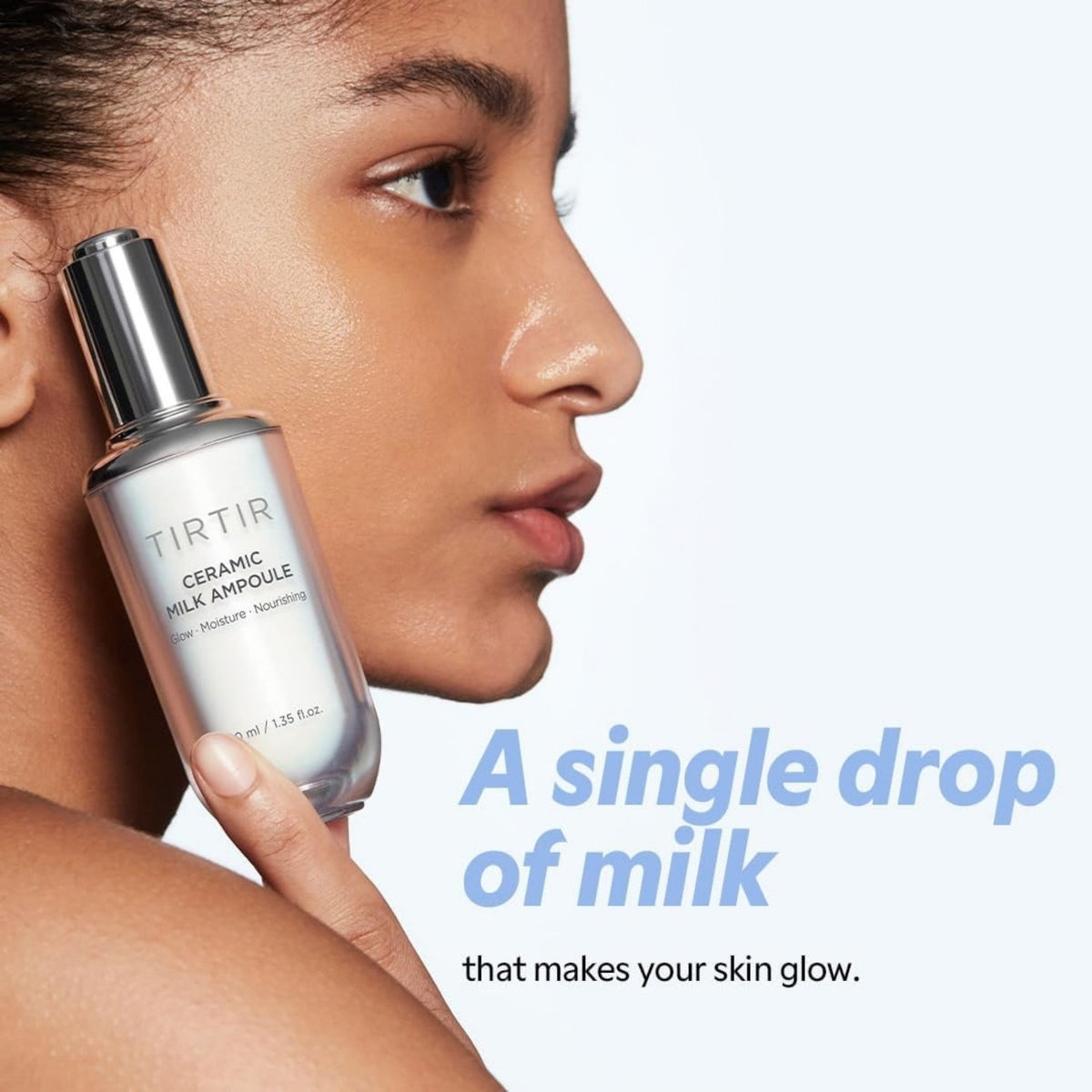 Refect Beauty TIRTIR Ceramic Milk Ampoule held by a model to showcase a dewy glass skin glow and milky serum texture
