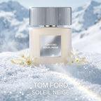 Refect Beauty Tom Ford Soleil Neige perfume bottle set in snowy landscape with white floral accents