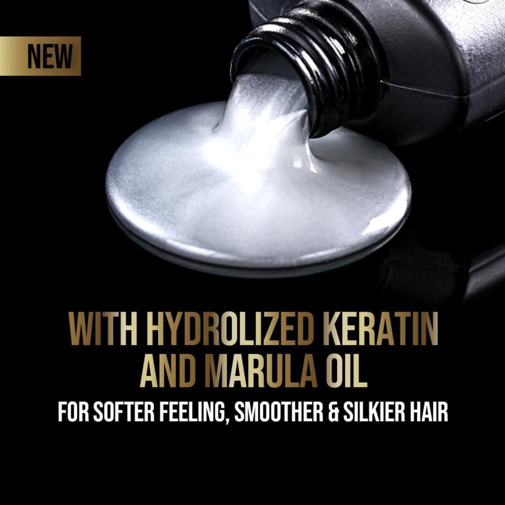 Refect Beauty Tresemme Pro Keratin Shampoo pouring out of a black bottle, showing a thick, pearlescent white texture.