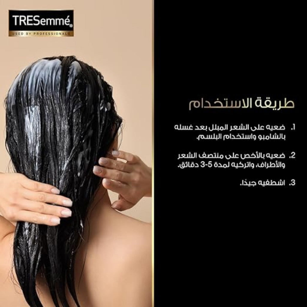 Refect Beauty TRESemmé Keratin Smooth Conditioner applied to dark hair for frizz control and nourishment