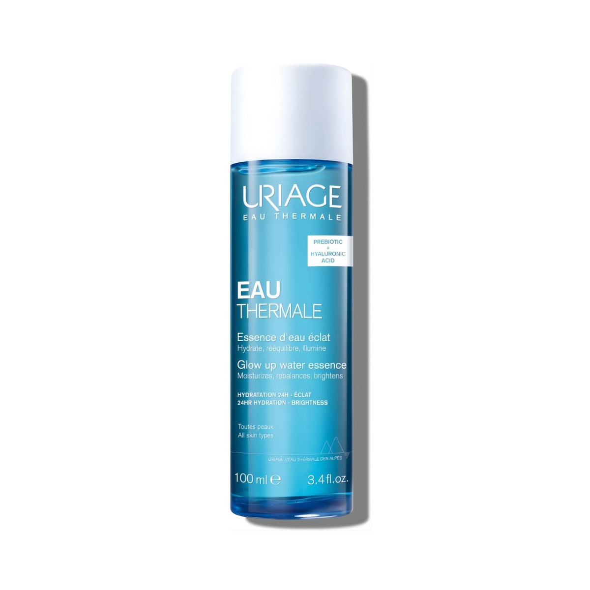 Refect Beauty Uriage Glow Up Water Essence bottle with blue liquid and white cap for hydrating and brightening skin