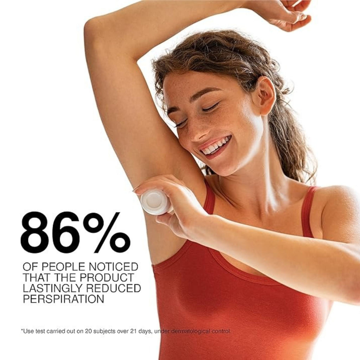 Refect Beauty Uriage Eau Thermale Power 3 deodorant applied by a smiling woman in a red tank top for odor protection