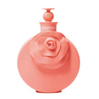 Refect Beauty Valentino Blush eau de parfum in a round coral pink bottle featuring a prominent 3D rose design