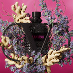 Refect Beauty Valentino Born in Roma Uomo Extradose perfume bottle surrounded by lavender and ginger on pink background