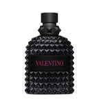 Refect Beauty Valentino Born in Roma Uomo Extradose perfume bottle with iconic black studded glass and pink logo.