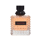 Refect Beauty Valentino Donna Born in Roma Coral Fantasy perfume bottle with coral liquid and rockstud glass design