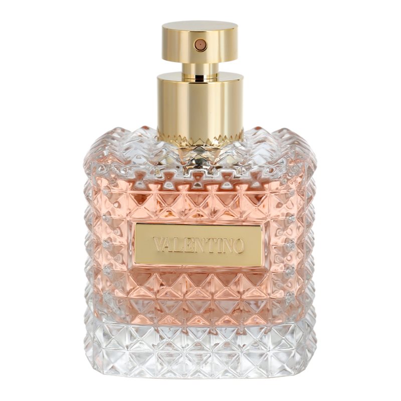 Refect Beauty Valentino Donna Eau de Parfum in a clear glass bottle with a textured stud design and gold cap.