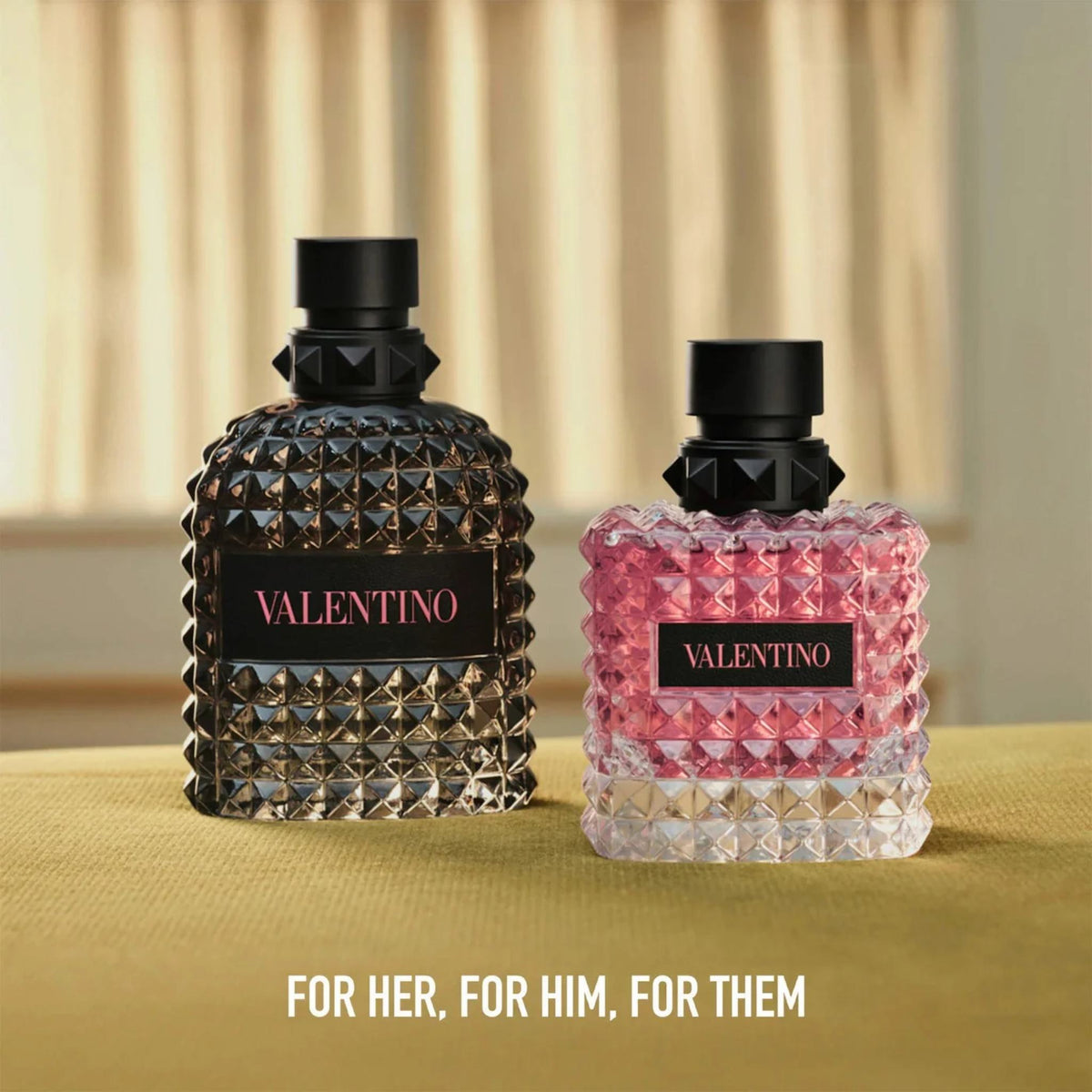 Refect Beauty Valentino Donna and Uomo fragrance bottles with iconic studded glass design on a table