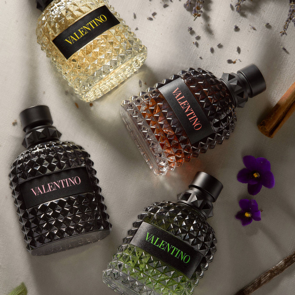 Refect Beauty collection of four Valentino Uomo Born In Roma fragrance bottles with iconic studded glass design