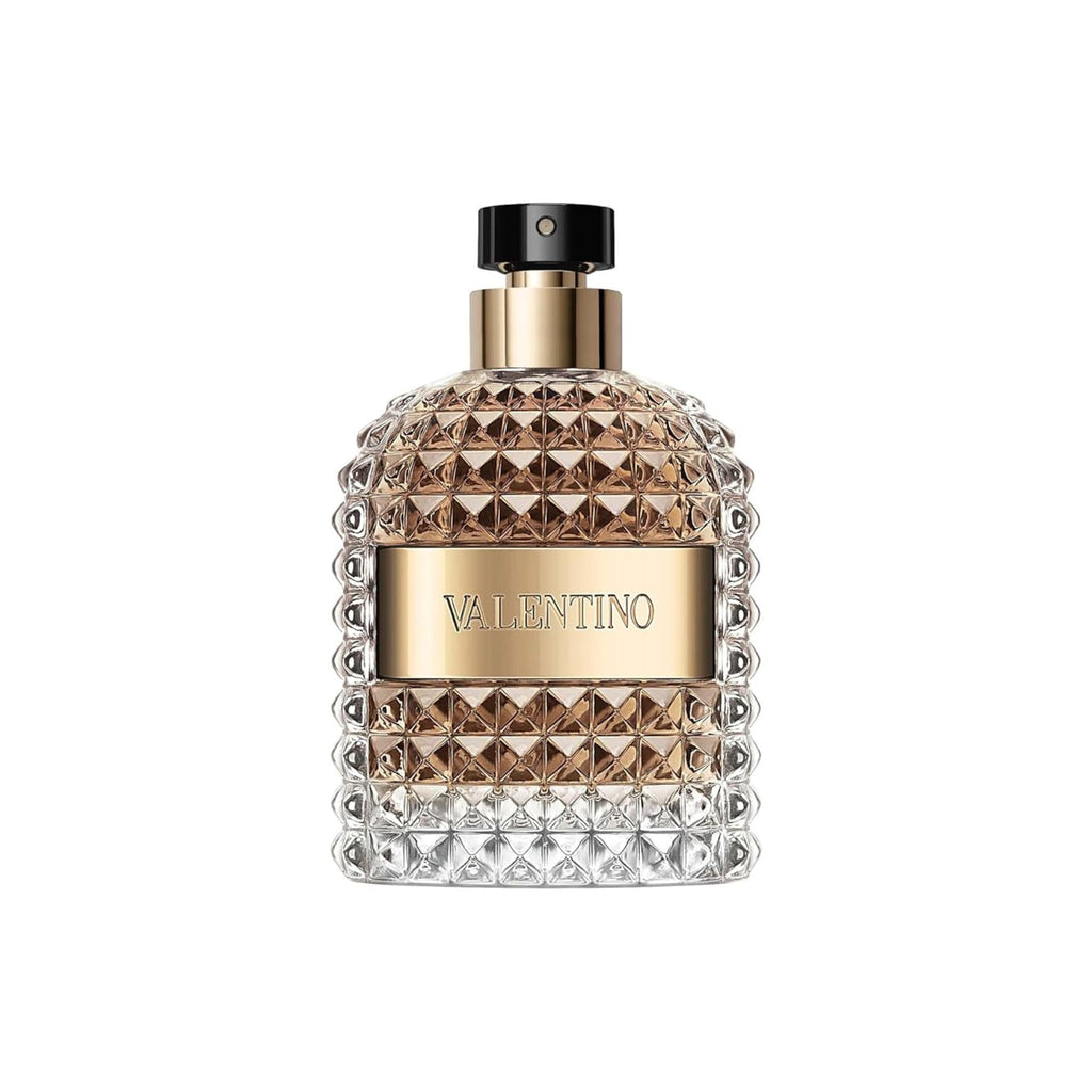 Refect Beauty Valentino Uomo Eau de Toilette in a glass bottle with gold accents and a textured stud design.