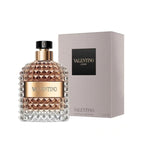 Refect Beauty Valentino Uomo Eau de Toilette in a textured glass bottle with gold accents and matching grey box.