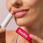 Refect Beauty Vaseline Lip Therapy Rosy Lips balm being applied to lips for a soft, tinted, and hydrated finish.