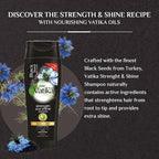 Refect Beauty Vatika Dabur Black Seed shampoo bottle with blue flower illustrations on a dark background