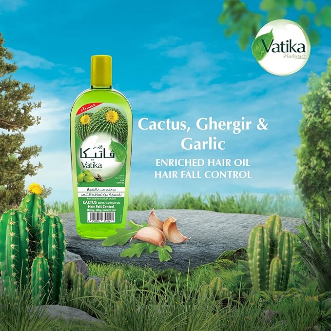 Refect Beauty Vatika Cactus Enriched Anti-Hair Fall Oil bottle displayed on a stone with cactus and garlic cloves
