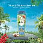 Refect Beauty Vatika Dabur Coconut and Castor Volume and Thickness Shampoo bottle on a tropical stone background.