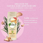 Refect Beauty Vatika Dabur Garlic natural hair growth shampoo bottle with garlic cloves on a pink background