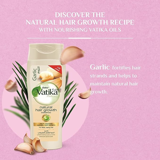 Refect Beauty Vatika Dabur Garlic natural hair growth shampoo bottle with garlic cloves on a pink background
