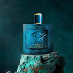 Refect Beauty Versace Eros Eau de Toilette bottle featuring a blue glass design with Medusa head on a textured rock
