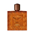 Refect Beauty Versace Eros Najim Parfum bottle in amber glass with iconic Medusa head and Greek key pattern.