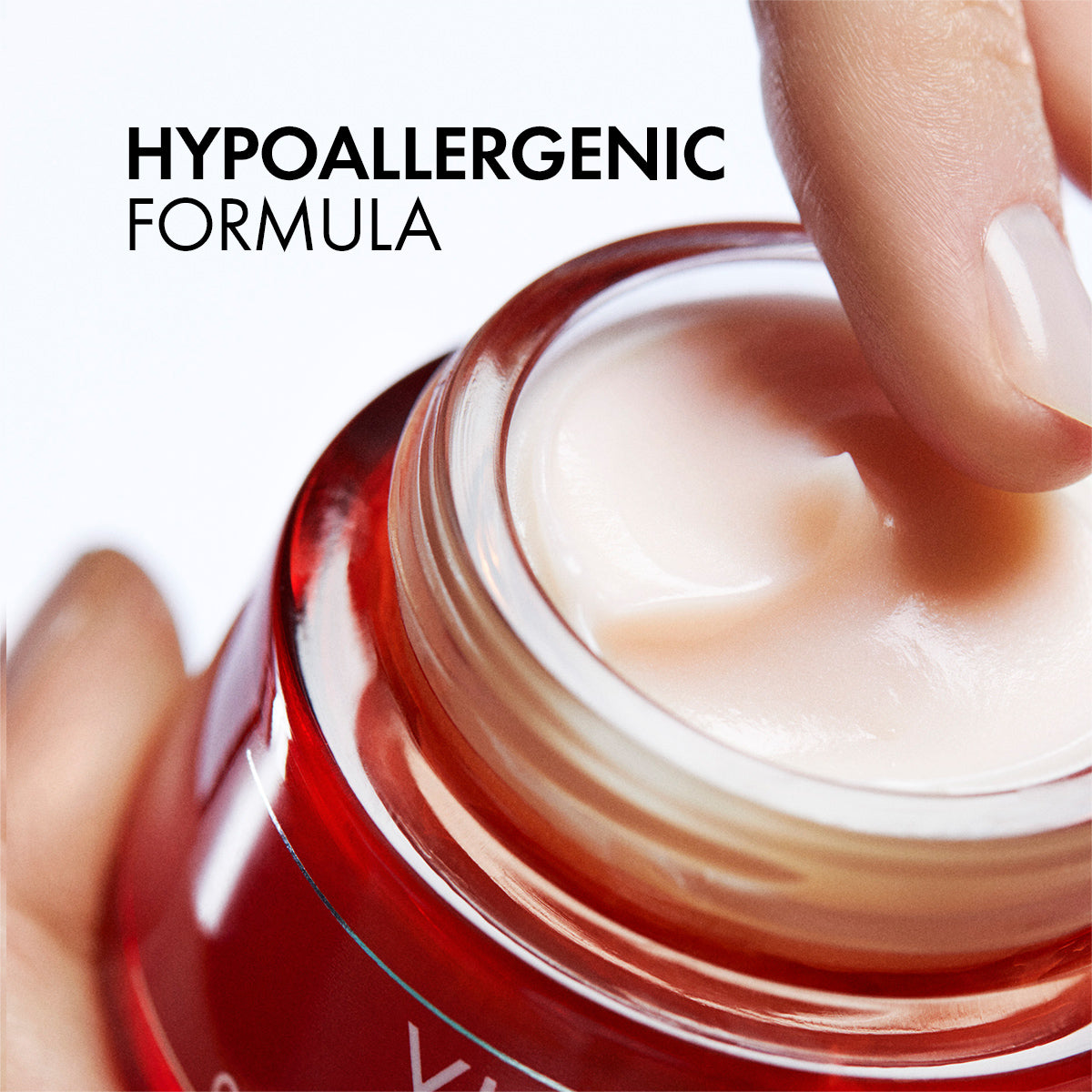 Refect Beauty Vichy Liftactiv Collagen Specialist cream with a smooth pink texture being applied by a finger