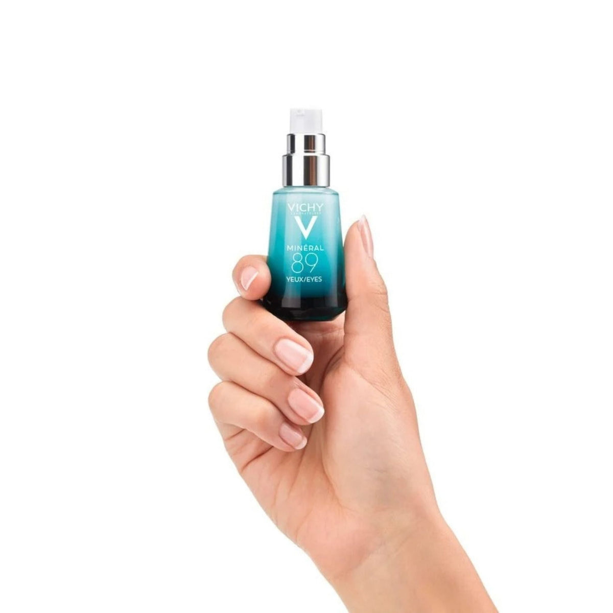Refect Beauty Vichy Mineral 89 Eye fortifier serum in a blue glass pump bottle held in a hand