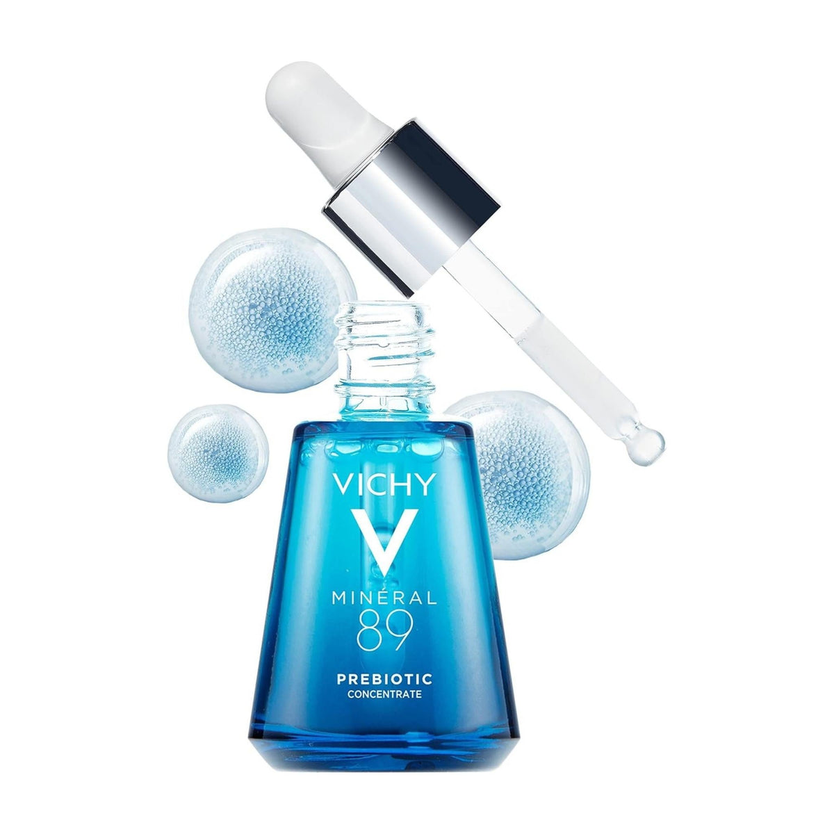Refect Beauty Vichy Minéral 89 Prebiotic Fractions Serum in a blue glass bottle with a glass dropper applicator.