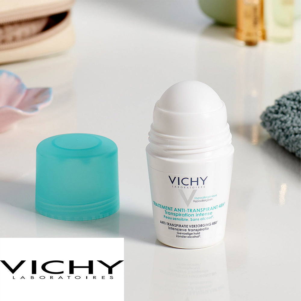 Refect Beauty Vichy Anti-Perspirant 36H roll-on deodorant with a white bottle and light blue cap on a vanity surface.