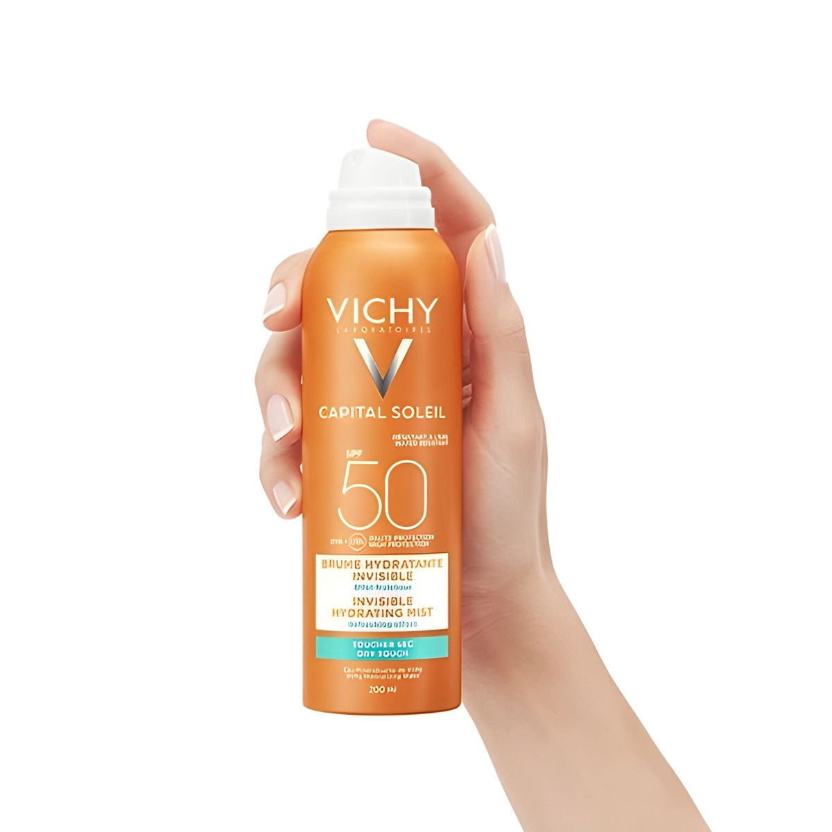 Refect Beauty Vichy Capital Soleil Invisible Hydrating Mist SPF 50 held in a hand for easy application