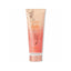 Refect Beauty Victoria's Secret Island Market Sunlit Resort body lotion in a peach and coral gradient squeeze tube.