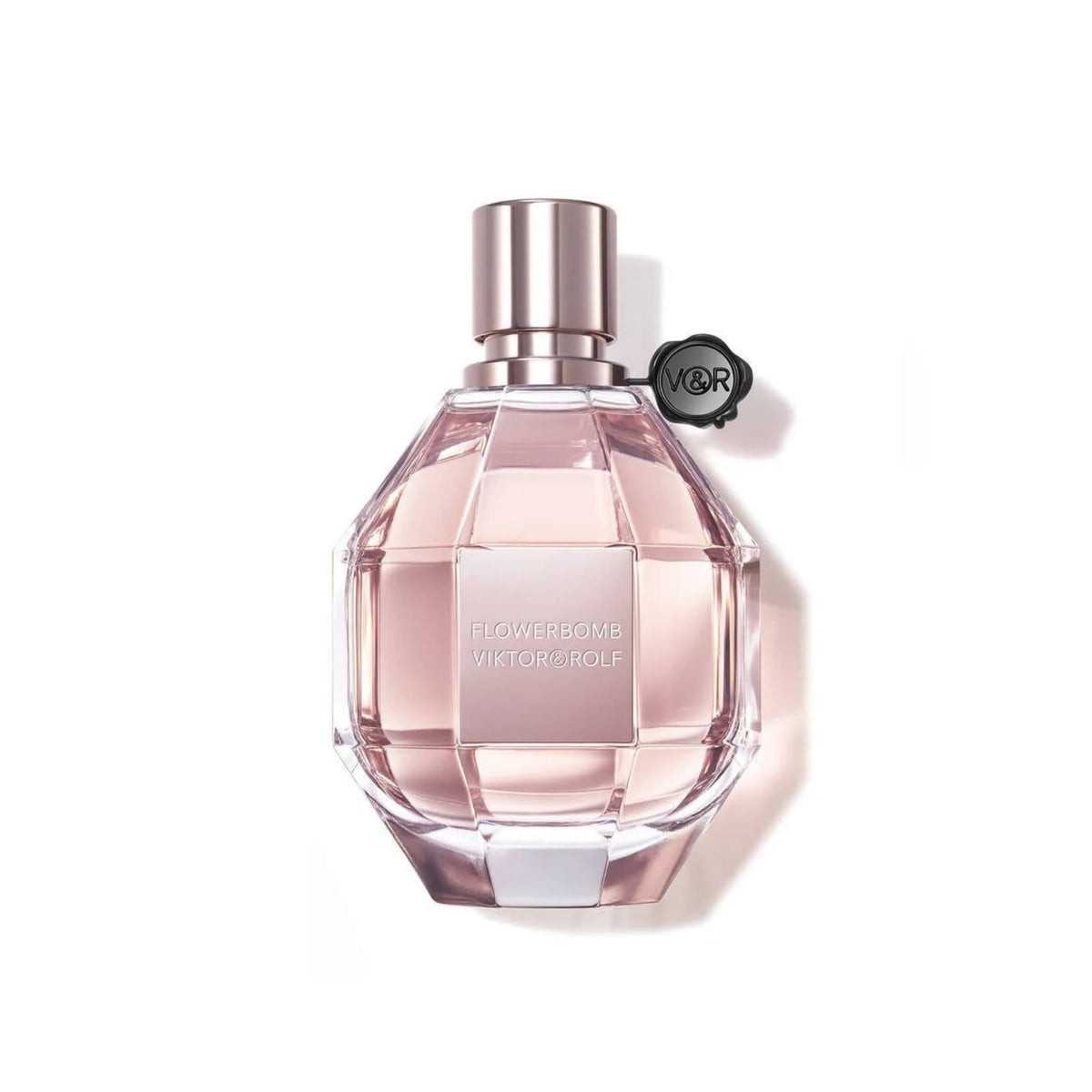 Refect Beauty Viktor & Rolf Flowerbomb Eau de Parfum in a faceted pink glass bottle with a signature black seal
