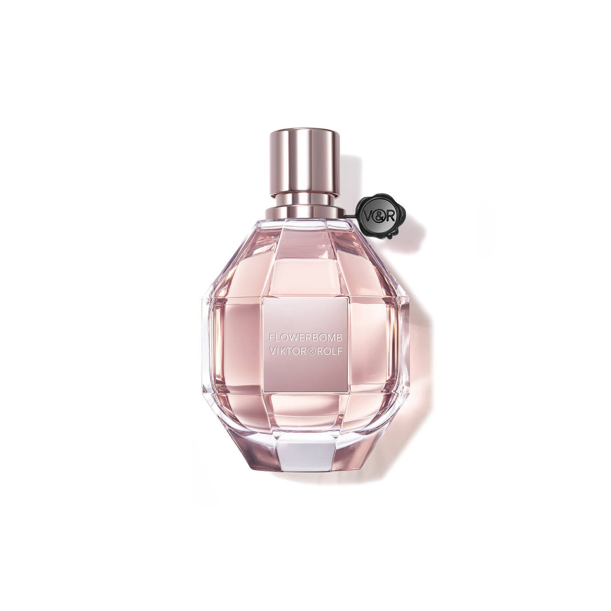 Refect Beauty Viktor & Rolf Flowerbomb Eau de Parfum in a faceted pink glass bottle with a signature black seal.