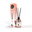 Refect Beauty Gulf Orchid Watermelon reed diffuser with glass bottle, black reeds, and peach-colored packaging box.