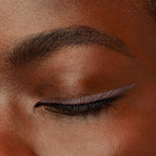 Refect Beauty Bourjois Contour Clubbing waterproof eyeliner applied as a precise wing on a model with dark skin