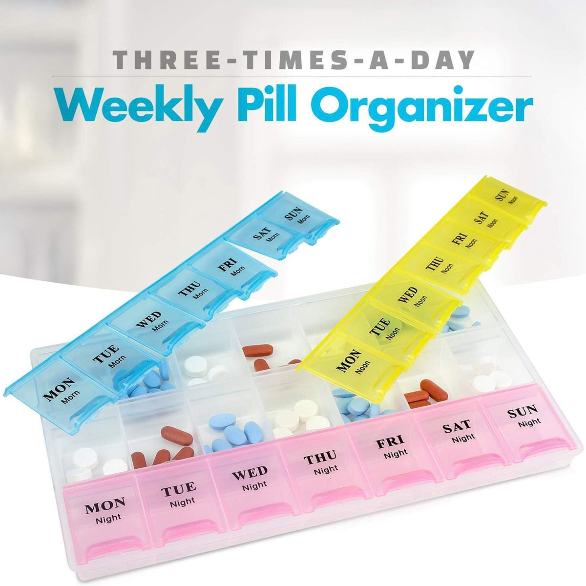 Refect Beauty 7-day multi-dose pill organizer with blue, yellow, and pink compartments for morning, noon, and night.