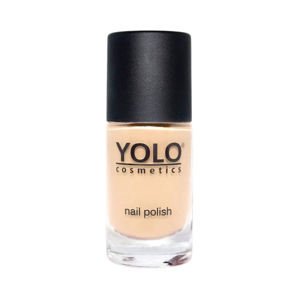 Refect Beauty Yolo Nail Polish Creamy in a neutral beige shade with a smooth, glossy finish in a glass bottle.