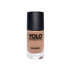 Refect Beauty YOLO nail polish in a neutral beige shade with a high-gloss finish in a glass bottle.