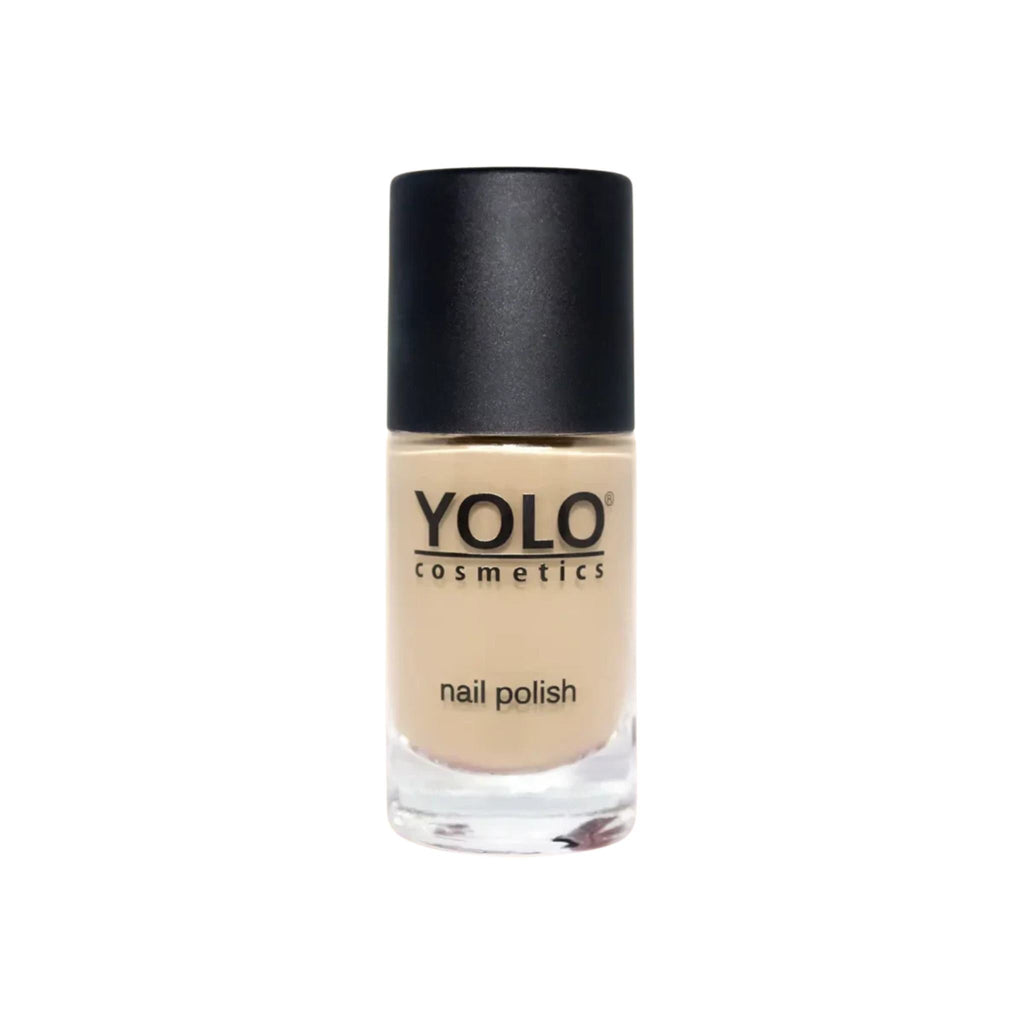 Refect Beauty YOLO nail polish in a neutral beige shade with a high-gloss finish in a clear glass bottle.