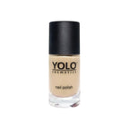 Refect Beauty YOLO nail polish in a neutral beige shade with a high-gloss finish in a clear glass bottle.
