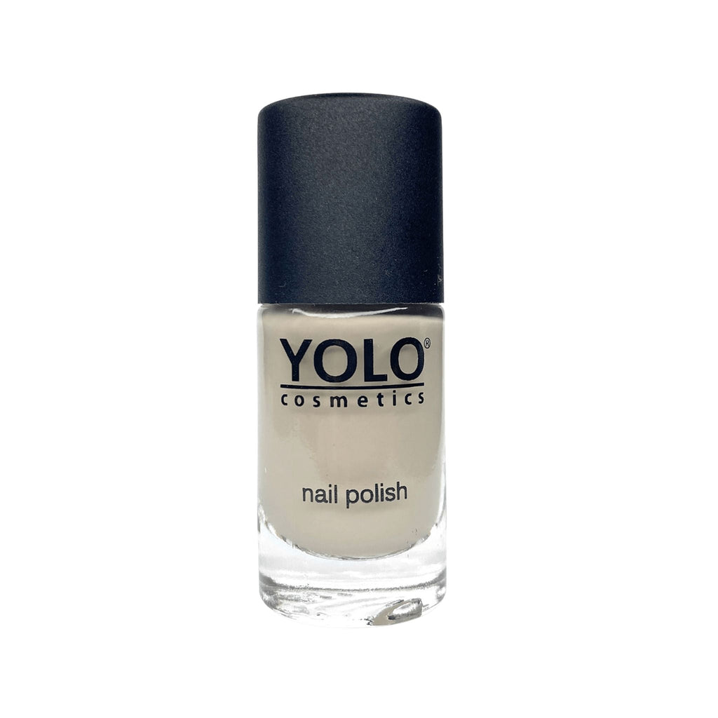 Refect Beauty Yolo Limited Edition nail polish in a neutral beige shade with a glossy finish in a glass bottle.