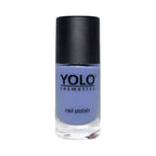 Refect Beauty Yolo creamy nail polish in a soft periwinkle blue shade with a glossy finish in a glass bottle.