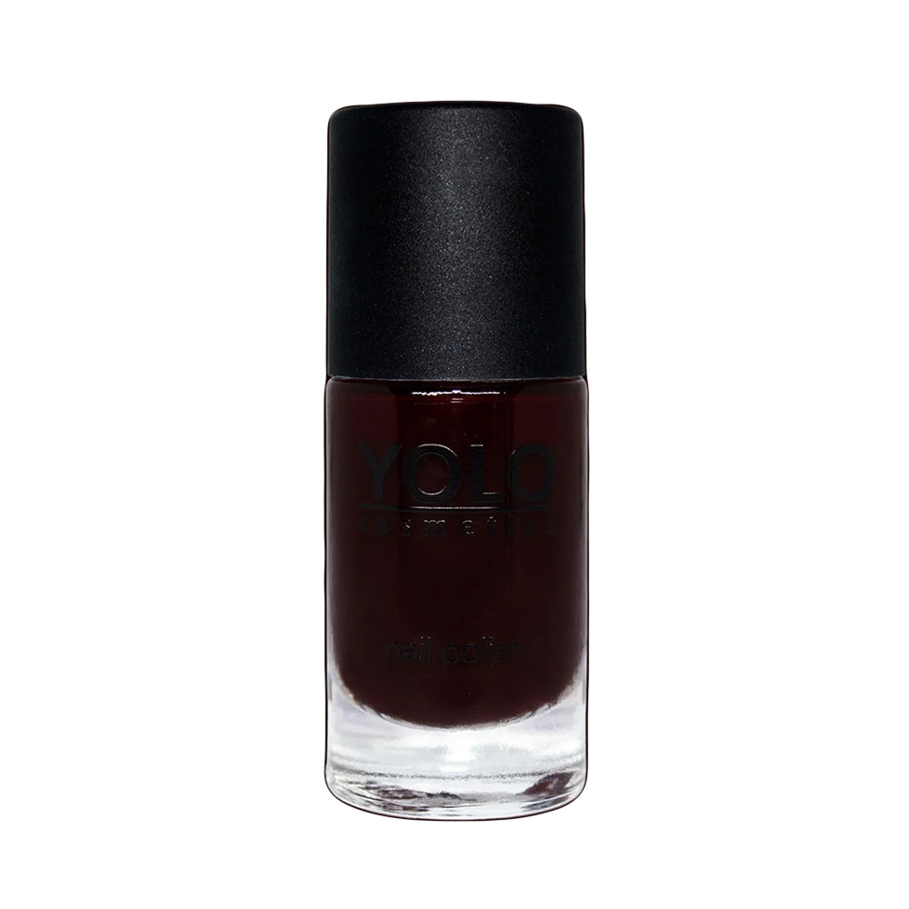 Refect Beauty Yolo creamy nail polish in a deep dark burgundy shade with a smooth glossy finish in a glass bottle.