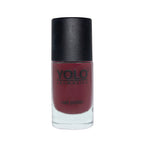 Refect Beauty Yolo Nail Polish in a deep burgundy shade with a smooth creamy finish in a glass bottle.