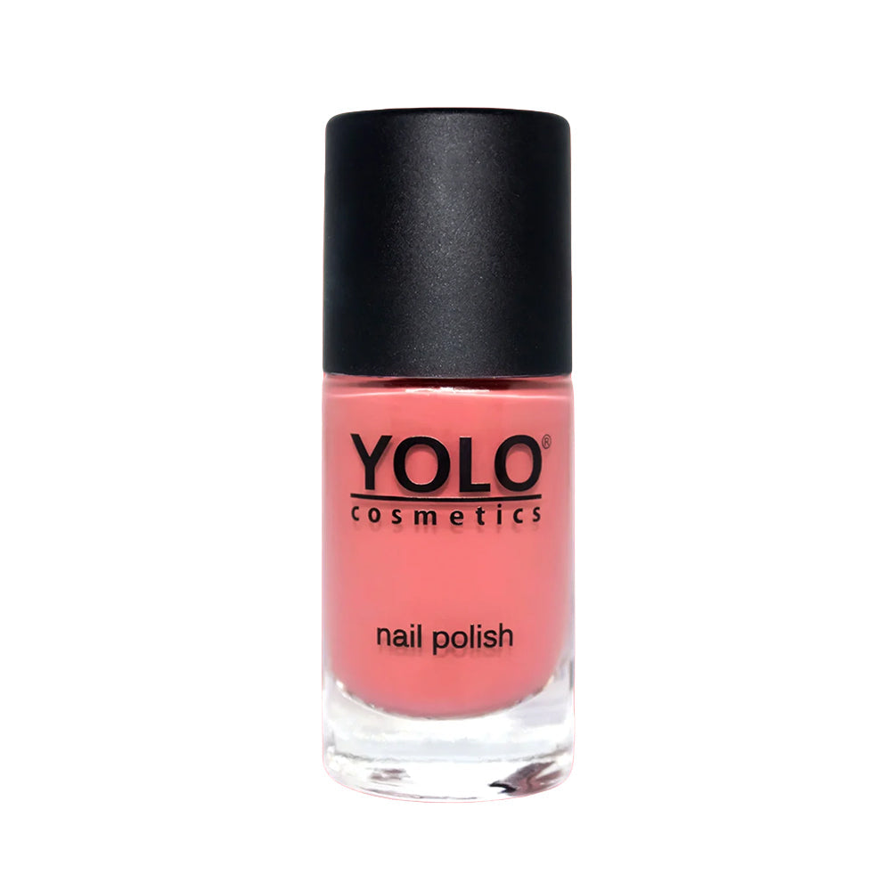Refect Beauty Yolo creamy nail polish in a soft coral pink shade with a smooth, glossy finish in a glass bottle.