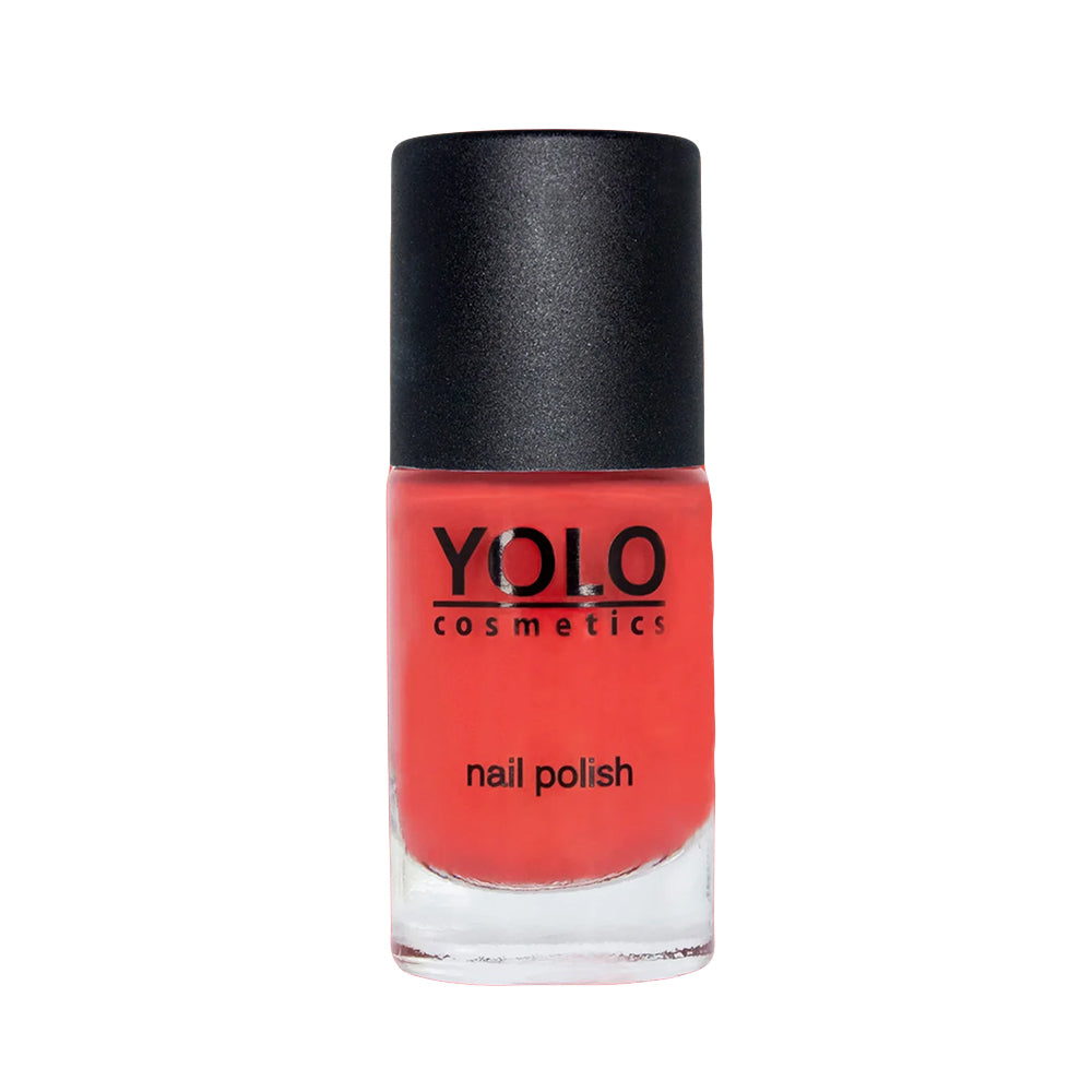 Refect Beauty Yolo Nail Polish Creamy in a vibrant coral red shade with a smooth, glossy finish in a glass bottle.