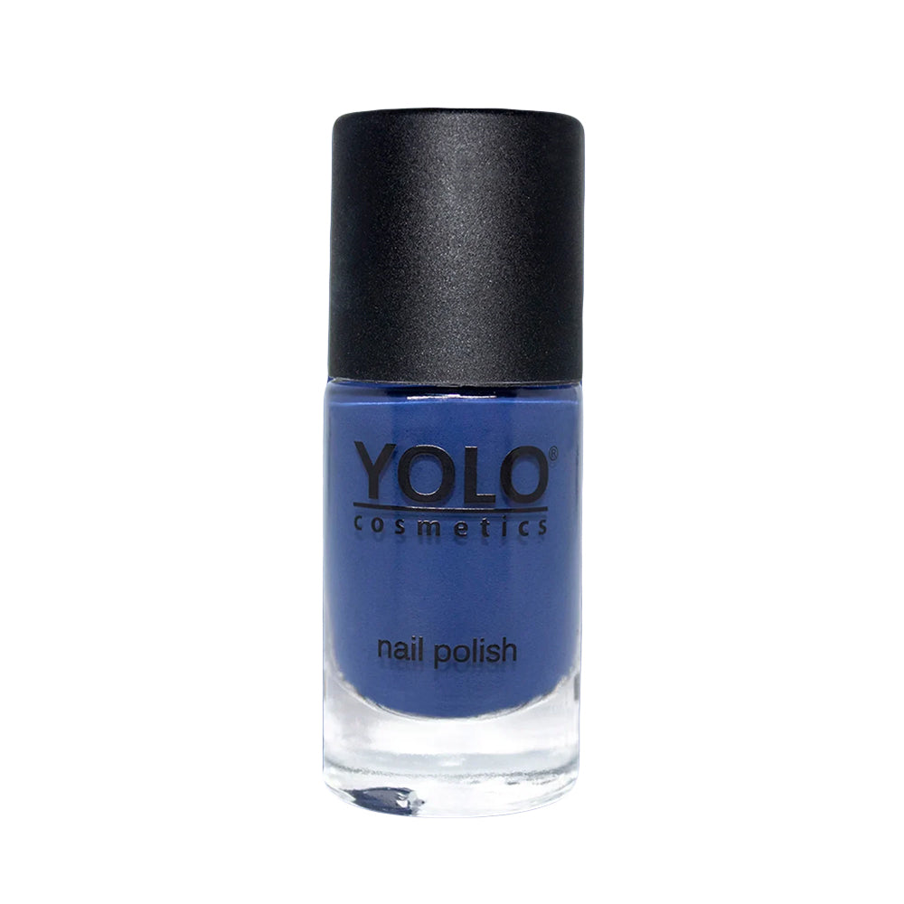 Refect Beauty Yolo Nail Polish in a rich, opaque blue shade with a smooth, glossy creamy finish in a glass bottle.