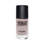 Refect Beauty Yolo Nail Polish Creamy in a soft neutral shade with a black cap in a clear glass bottle.