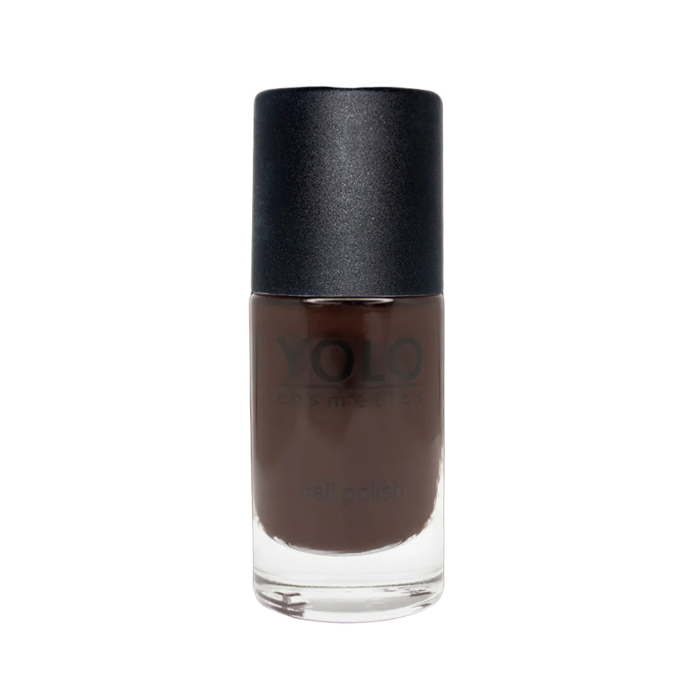 Refect Beauty Yolo Nail Polish in a rich, dark brown creamy shade with a glossy finish in a glass bottle.