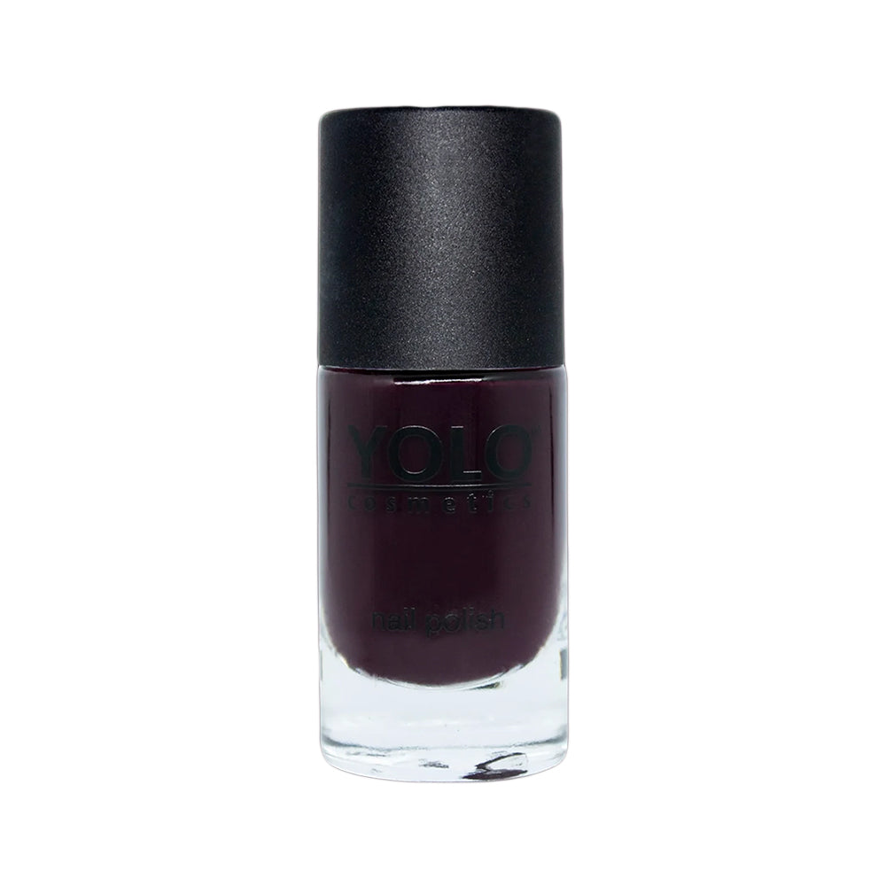 Refect Beauty Yolo Nail Polish in a deep dark plum shade with a smooth creamy finish in a glass bottle.