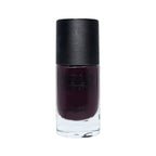 Refect Beauty Yolo Nail Polish in a deep dark plum shade with a smooth creamy finish in a glass bottle.