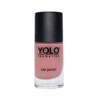 Refect Beauty Yolo Nail Polish Creamy in a soft dusty rose shade with a black cap in a glass bottle.